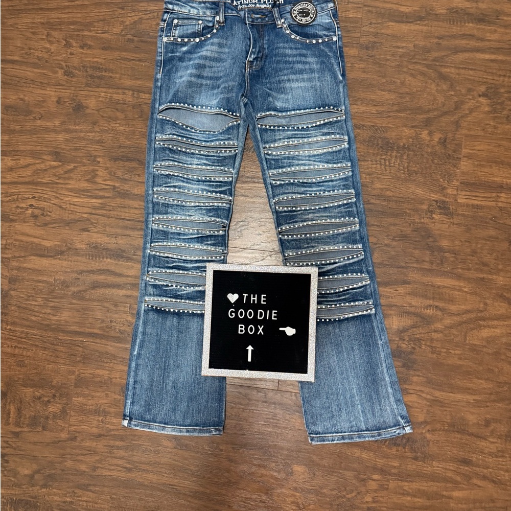 Trendy Blue Flare Jeans with Distressed Detailing
